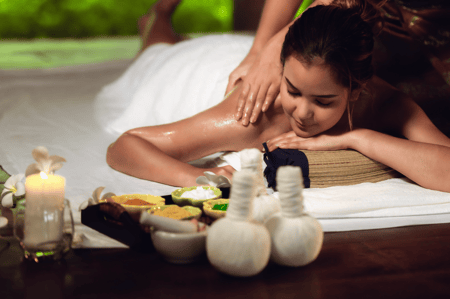 woman at massage table being massaged